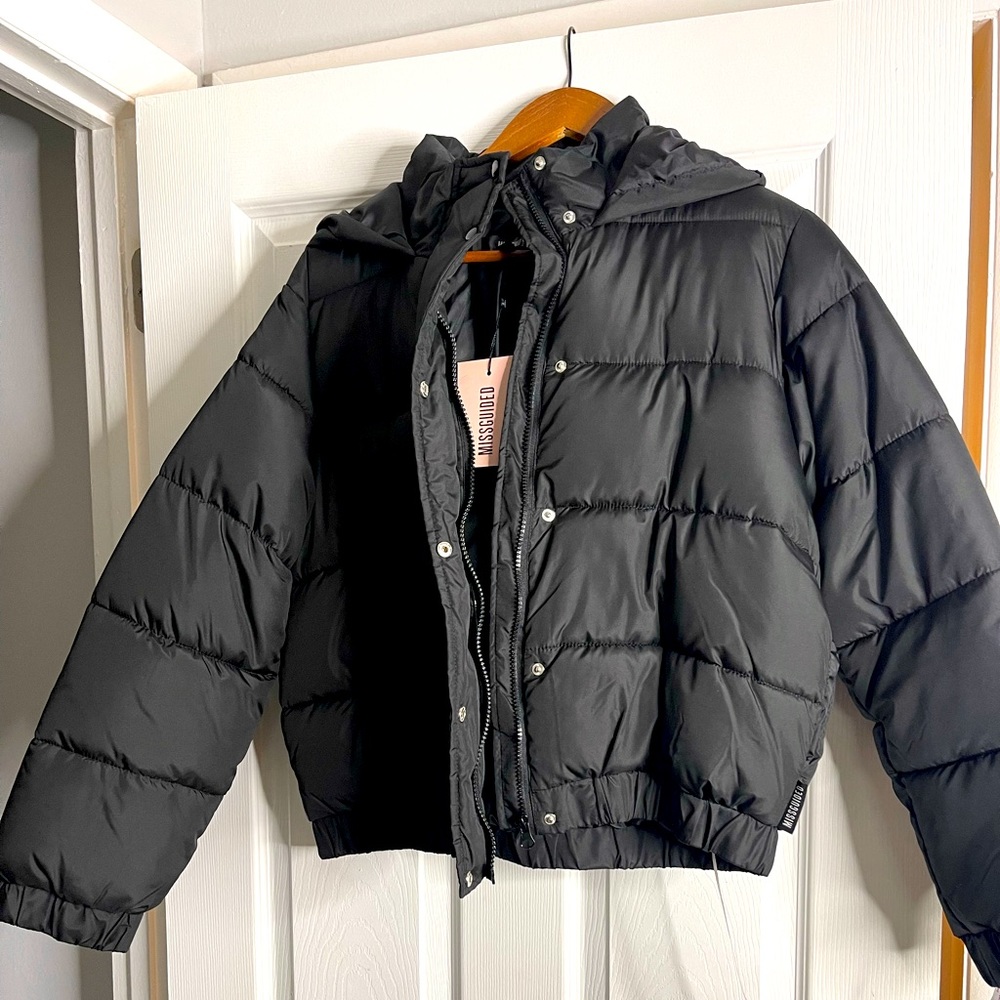 Black hooded puffer jacket by Missguided